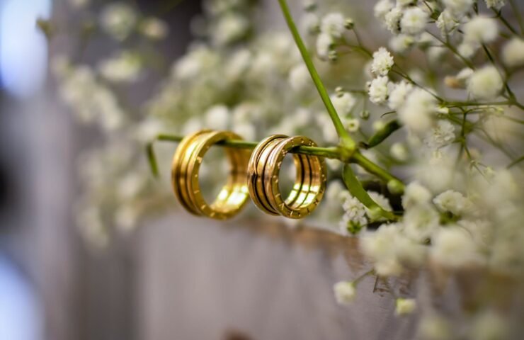 close up photo of gold wedding rings